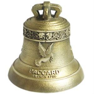 Decoration of a bronze bell for an original gift for a baptism